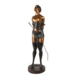 After Bruno Zach - an erotic bronze / brass study of a semi clad girl holding a whip, 74cms high.