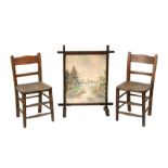 A pair of children's elm and beech chairs; together with an oak fire screen; a Victorian prie dieu