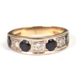 A 9ct gold diamond and sapphire ring, approx UK size 'J', 2.9g.