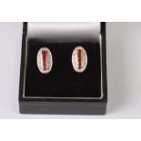 A pair of 9ct gold ruby and diamond stud earrings, 2.7g.