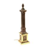 A brass Corinthian column table lamp, 55cms high.