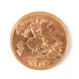 An Edward VII 1910 gold half sovereign.