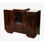 A continental Art Deco figured walnut sideboard, the stepped top with marble inserts with central