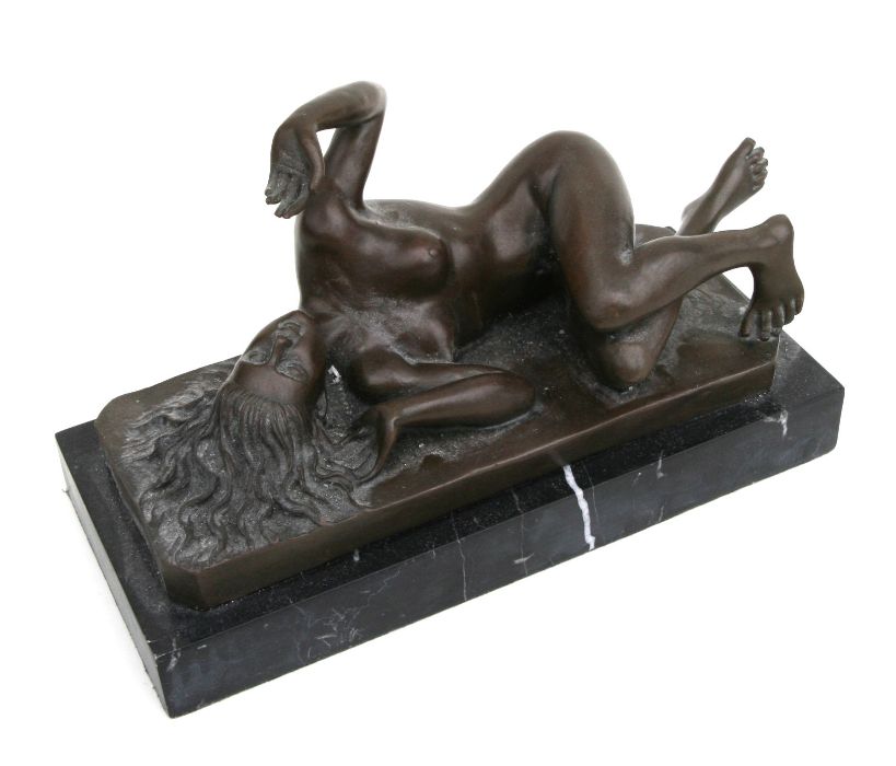 After Milo - a bronze study of a recumbent naked female on a marble plinth, 27cms wide.