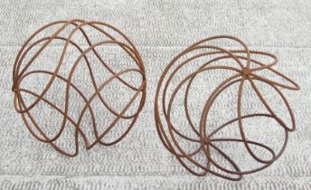 A pair of metal garden spheres, 42cms (16.25ins) diameter (2).