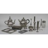 A large quantity of silver plated items to include table top cigarette box, candlesticks, teapots,