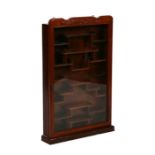 A Chinese hardwood wall mounted display cabinet, 51cms wide.