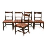 Five Regency mahogany dining chairs with drop-in upholstered seats, on turned and reeded front