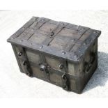 An 18th century wrought iron Armada or strong box with vestiges of original paint, 61cms wide.