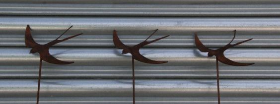 A set of three iron flying swallow garden stakes (3).