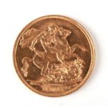 An Edward VII 1908 gold full sovereign.