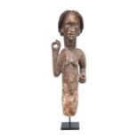 African Art / Tribal Art: a rare carved wooden Lumbo female reliquary figure mounted on a stand,