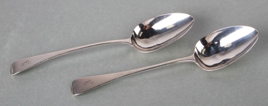 A pair of George III silver serving spoons, initialled, London 1811, 22cms long, 125g (2).