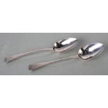 A pair of George III silver serving spoons, initialled, London 1811, 22cms long, 125g (2).