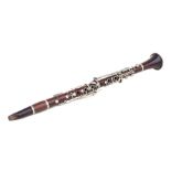 A Ball Beavon & Co. five-piece rosewood clarinet, 65cms long.