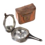 A DW Brunton's American military sighting compass, no: 24049, cased, 7cms wide.