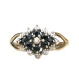 A 9ct gold, diamond and sapphire cluster ring, approx UK size 'M', 2.2g.