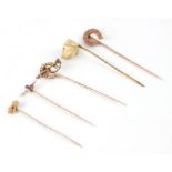A quantity of Victorian gold and yellow metal stick pins including 9ct, 15ct and diamond, ruby and
