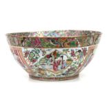 A 19th century Chinese Canton Export famille rose punch bowl decorated with figures, flowers and
