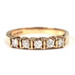 A 9ct gold five-stone diamond ring, approx UK size 'M', 2.6g.