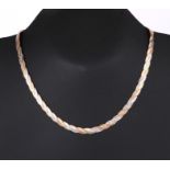 A 9ct tri-gold necklace, 43cms long, 12.2g.Condition ReportGood overall condition.