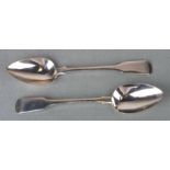 A pair of George III silver serving spoons, Exeter 1816, 23cms long, 140g (2).