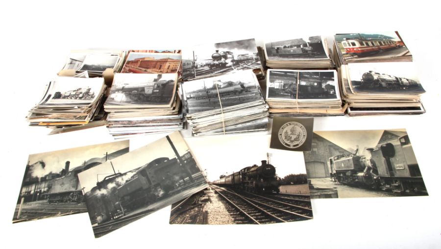 A large quantity of postcards, cigarette cards and a quantity of real photographs depicting