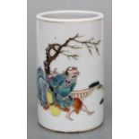 A Chinese famille rose bitong / brush pot decorated a man seated under a tree with Tongzhi mark to