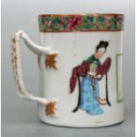 A Chinese Canton export famille rose cider mug decorated figures and calligraphy. (a/f) 11cm high