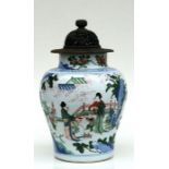 A large Chinese famille rose Ducai baluster vase with pierced hardwood cover, decorated with figures