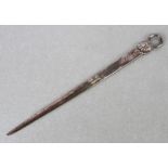 A Georgian style silver meat skewer, London 1962, 25cms long, 70g.