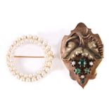 A 14ct gold pearl brooch, 3cms diameter, 5.3g; together with an Edwardian yellow metal brooch set