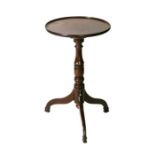 A 19th century mahogany occasional table on turned column and tripod base, 41cms diameter.