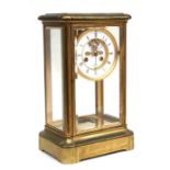 A 19th century French Le Roy & Fils brass cased mantle clock with mercury pendulum, number 8950, the