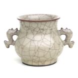 A Chinese two-handled crackle ware censer, 12cms high.