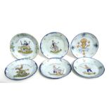 A group of French faience plates, 23cms diameter (6).