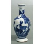 A Chinese blue & white vase decorated with deer and bats in a landscape, two character mark to the