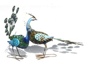 Two painted metal garden peacocks, the largest 73cms long (2).