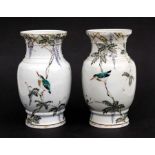 A pair of Chinese baluster vases decorated with kingfishers and other birds, 23cms high (2).