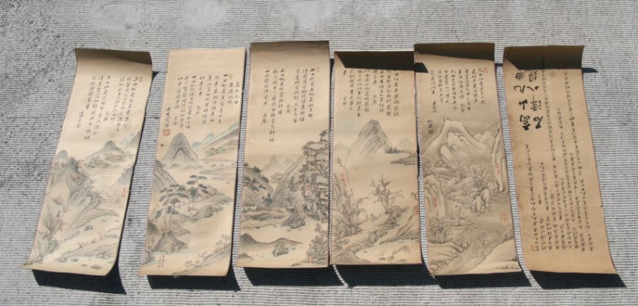 A group of Chinese scroll paintings to include landscape scenes and calligraphy, each 31 by 93cms (
