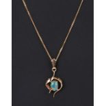 A yellow metal pendant set with an oval opal cabochon on an 18ct gold chain (chain weight 2.3g).