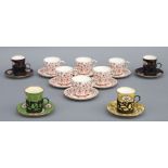 A set of four Edwardian Coalport silver mounted cabinet cups and saucers, London 1907; together with