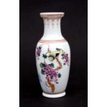 A Chinese Republic style baluster vase decorated with exotic birds within foliage and calligraphy,