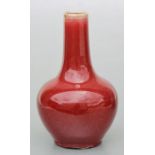 A Chinese flambé glaze bottle vase, 17cms high.Condition ReportSome chipping to the glaze around the