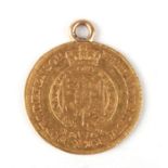 A George III 1804 gold half guinea with suspension loop, 4.4g.