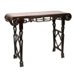 A 19th century Chinese hardwood altar or side table with scroll ends and carved and pierced