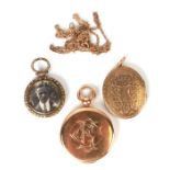 An Edwardian yellow metal locket initialled 'EC'; together with another similar decorated with