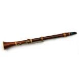 A 19th century pearwood and ivory clarinet by Metzler & Co. London, 59cms long. APHA registration of