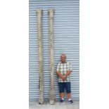 A pair of impressive distressed painted architectural oak columns, 299cms long (2).