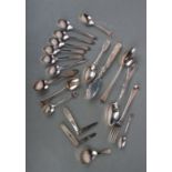 A set of six silver teaspoons, Sheffield 1943; together with two silver bladed fruit knives; a